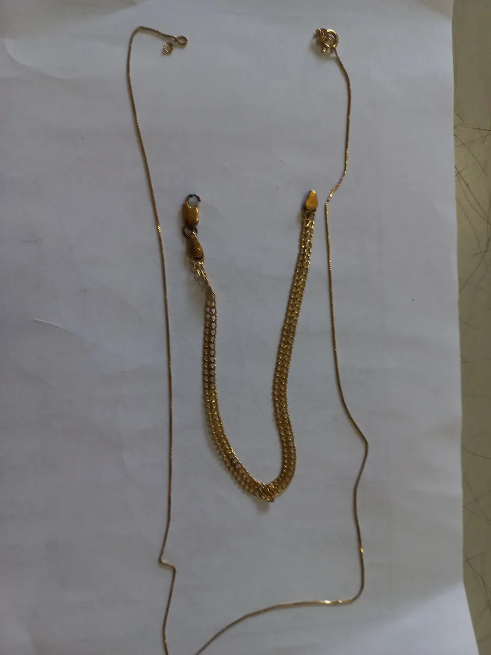 Pulseira e corrente em ouro