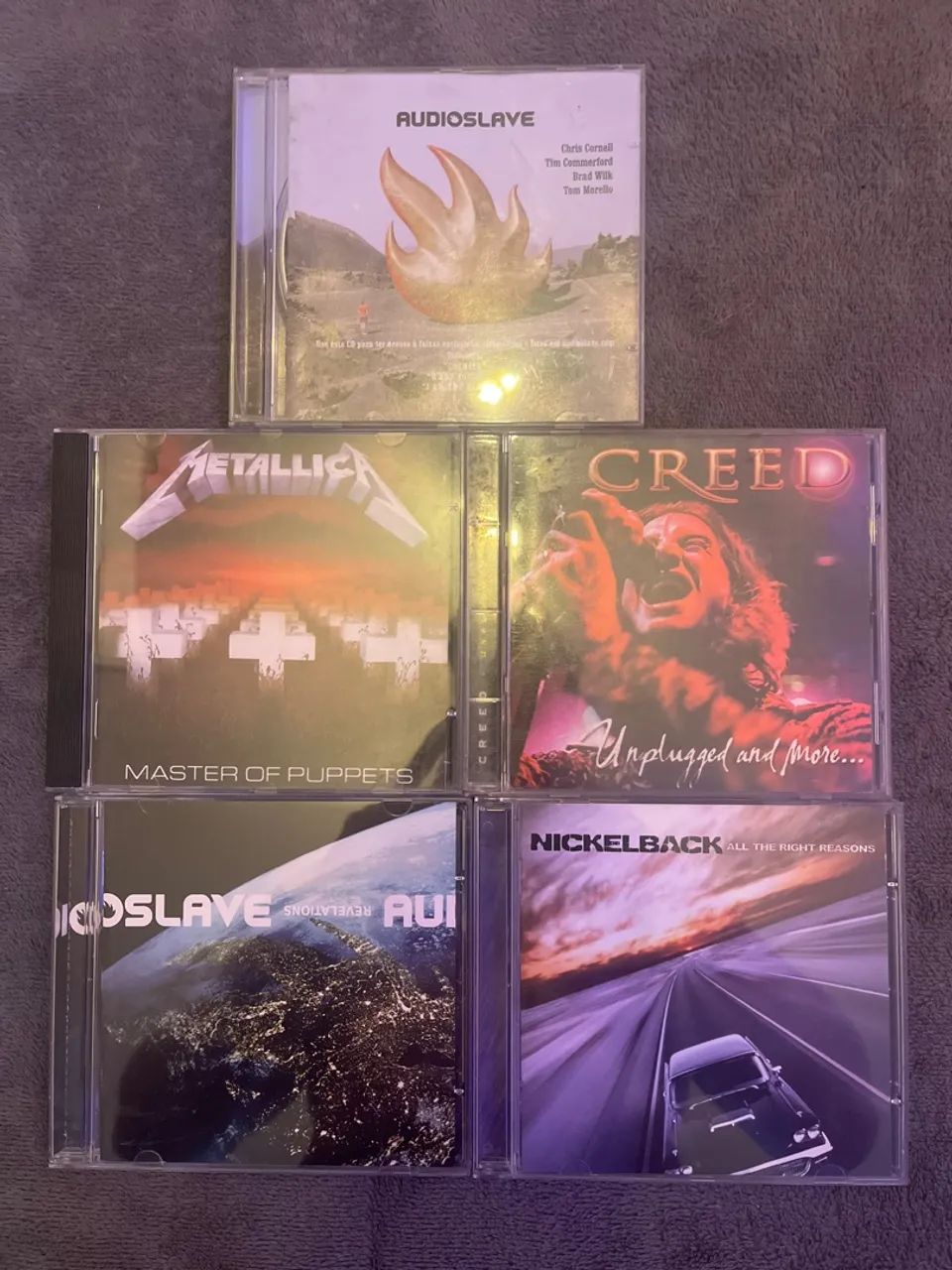CDs: Audioslave, Nickelback, Creed e Metallica