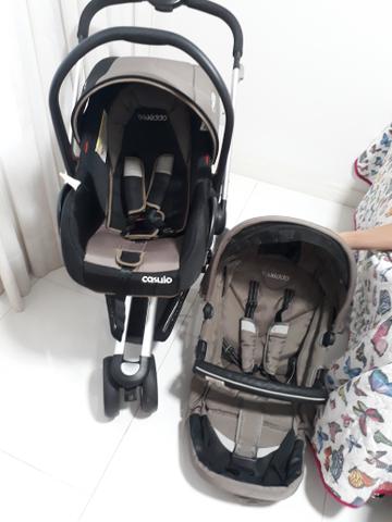 Carrinho de bebê e bebê conforto