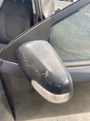 Retrovisor cerato lado esquerdo  usado com seta