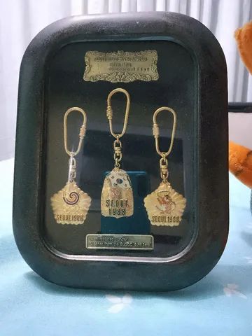 Estojo com 3 chaveiros olímpicos