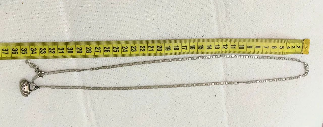 Vende-se Colar 35 cm fechado e 70 cm aberto, com pingente de Sereia e Bolsa banhado. - Foto 2