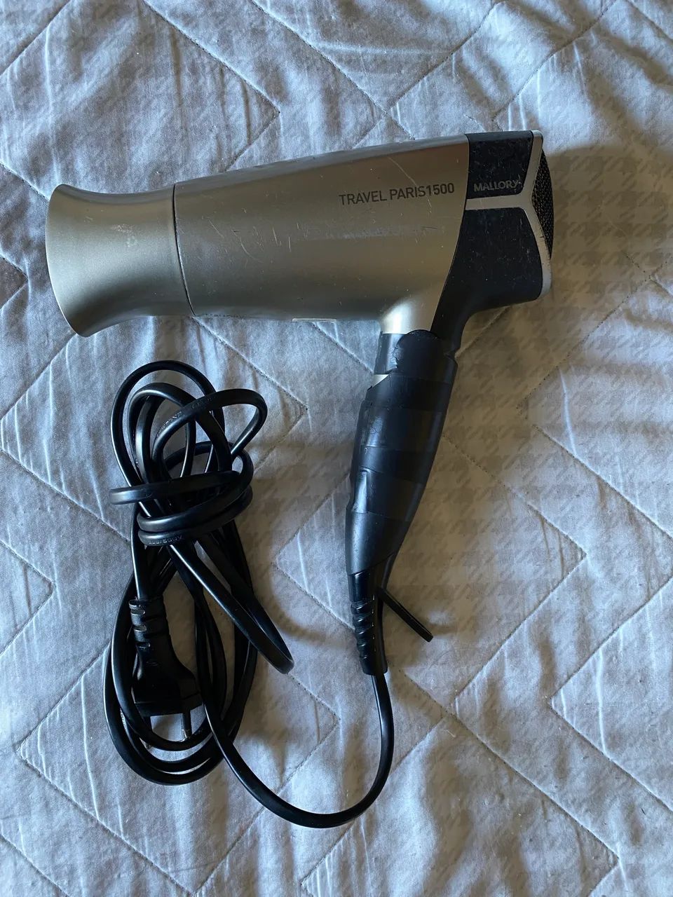 Secador de cabelo com defeito