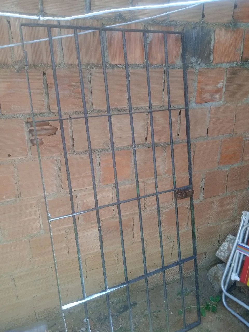 Portão de 1 metro e alguma coisa 
