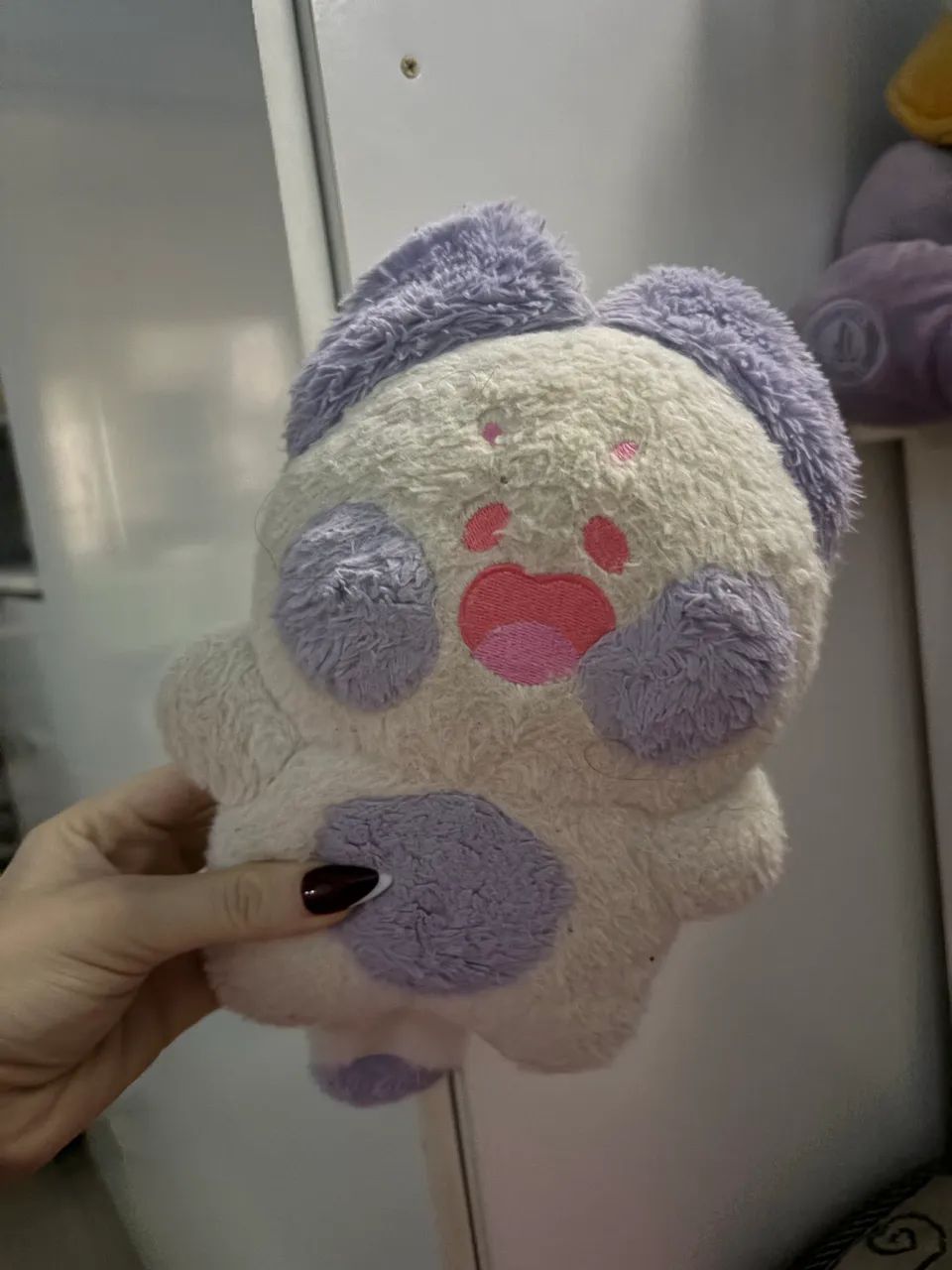 Pelúcia rosa e roxa 