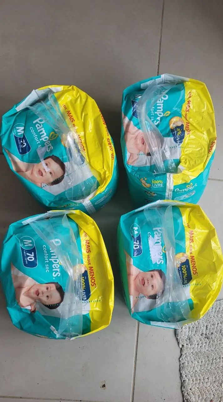 Vendo ou troco Fraldas Pampers M - Foto 2