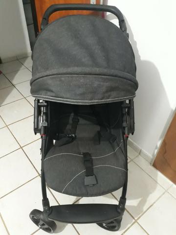 Carrinho de bebe e bebe conforto