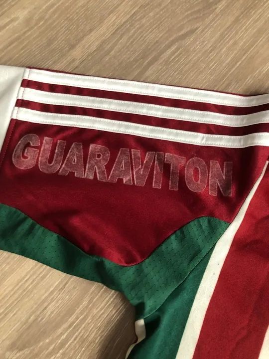 CAMISA FLUMINENSE COM COLA DO ADESIVO QUE DESCOLOU  TAMANHO P - Foto 4