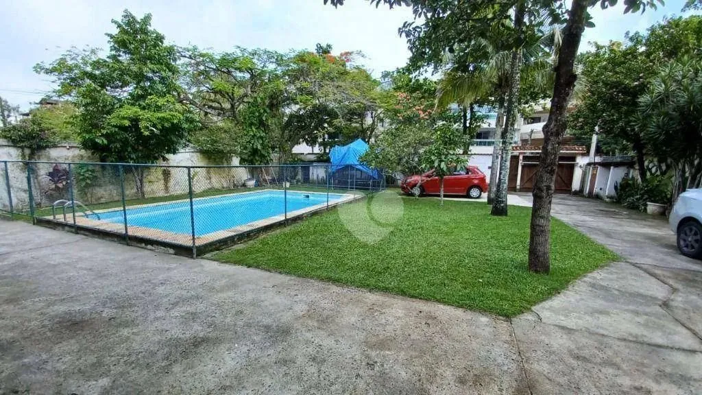 Terreno à venda com casa, piscina, 360 m² por R$ 1.900.000 - Recreio dos Bandeirantes - Ri