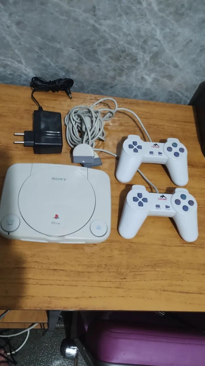Playstation one, com 2 controles e 4 jogos  - Foto 2