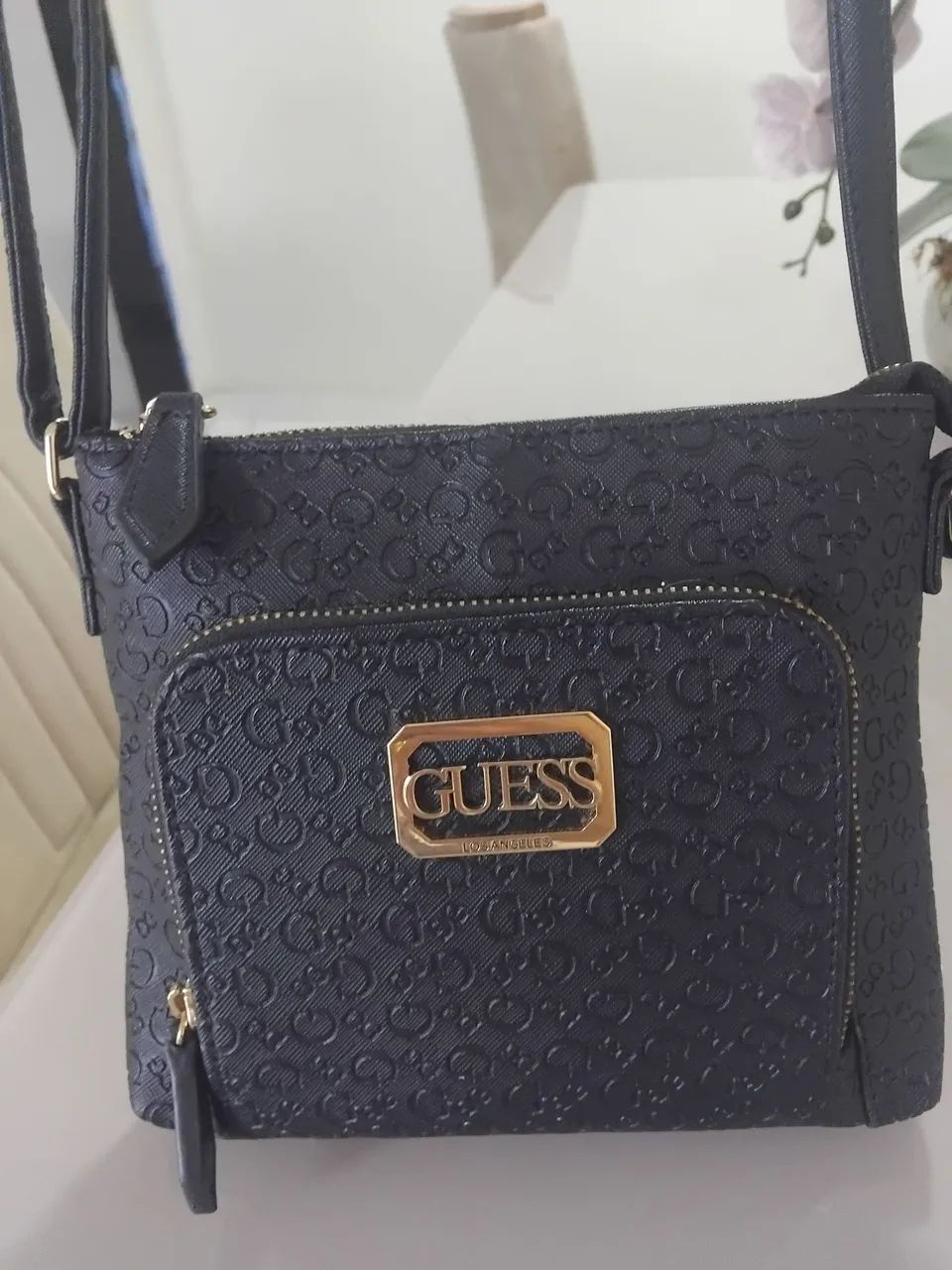 Bolsa guess original praticamente nova.