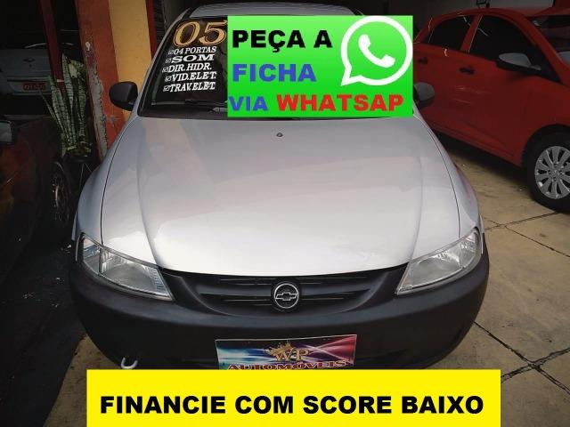 Gm - Chevrolet Celta Entrada 5000 ou menos faz com score baixo