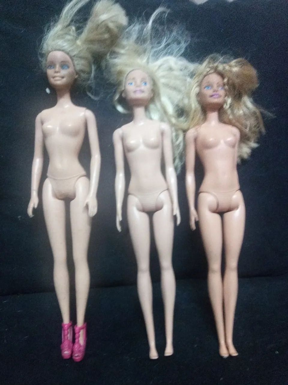 Três bonecas Barbie 