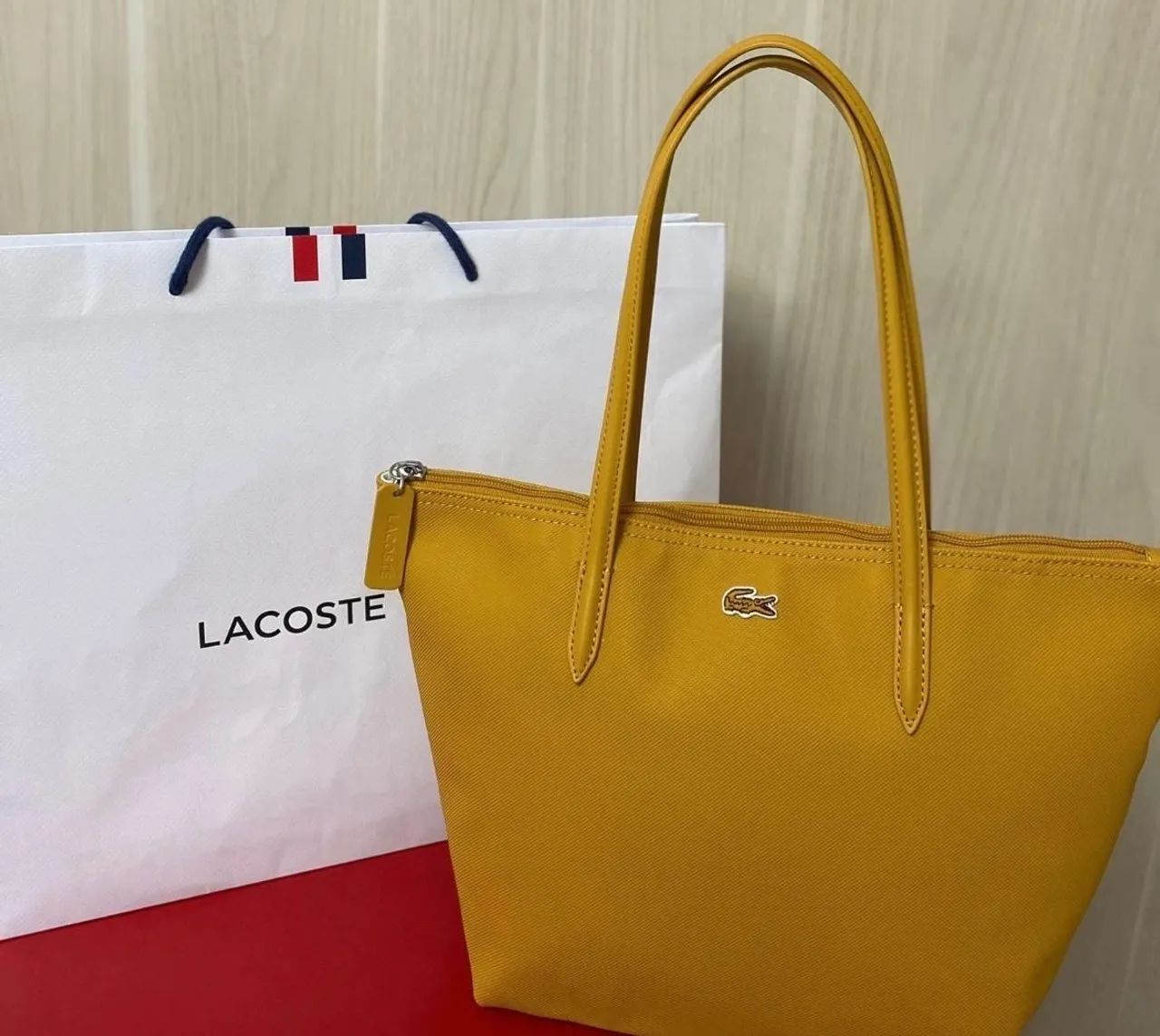 Bolsa Lacoste, original. Nova 