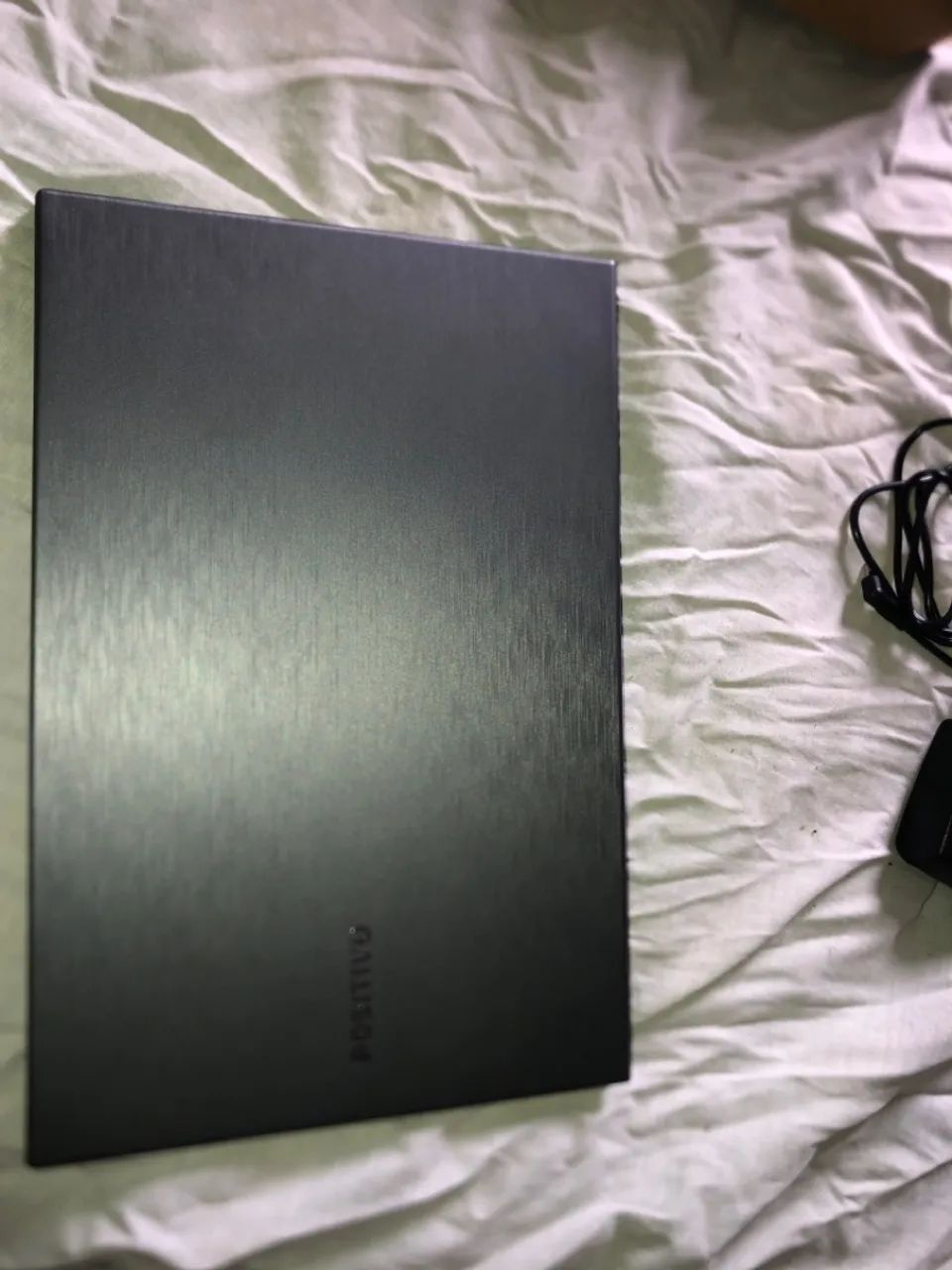 Notebook positivo estado de novo