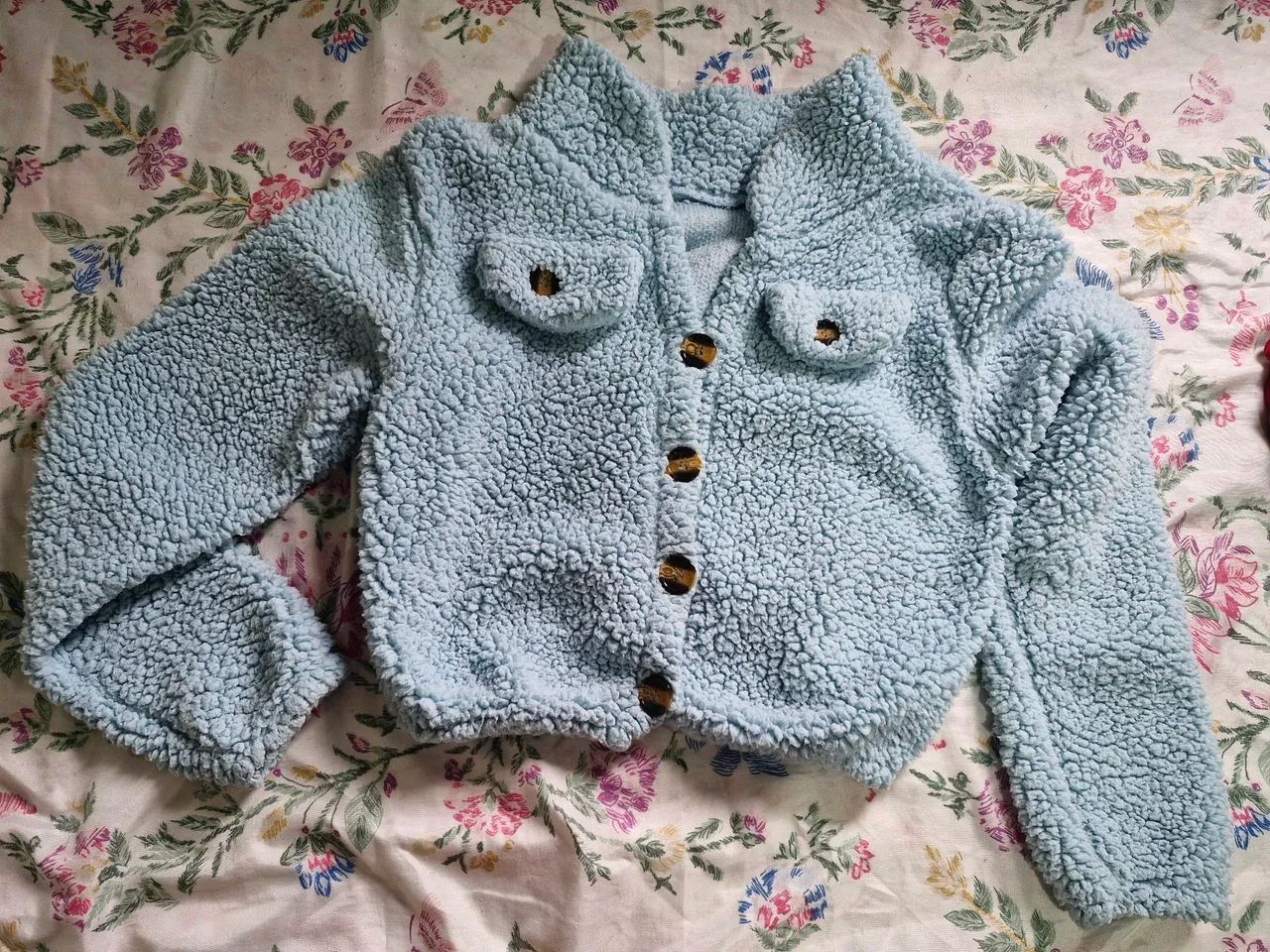 Blusa teddy
