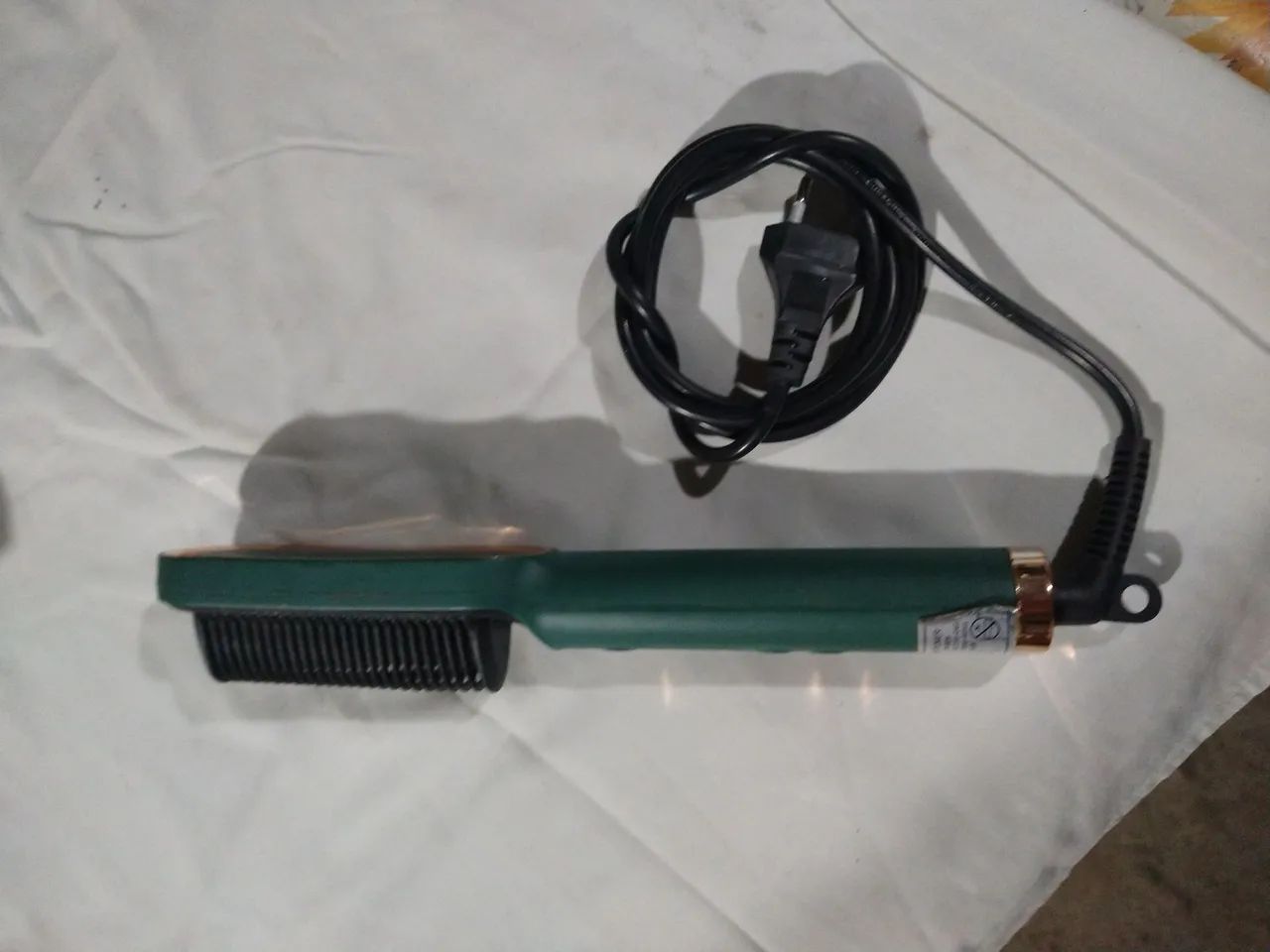 Escova alisadora com aquecimento bivolt. - Foto 4