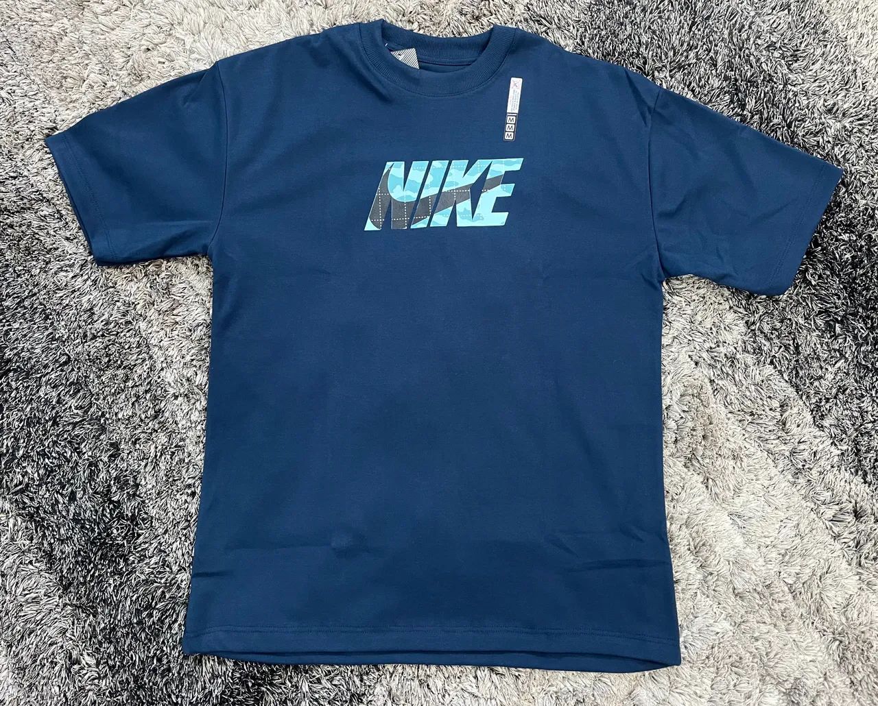 Camiseta Nike Oversized Malha Suedine Azul (M)