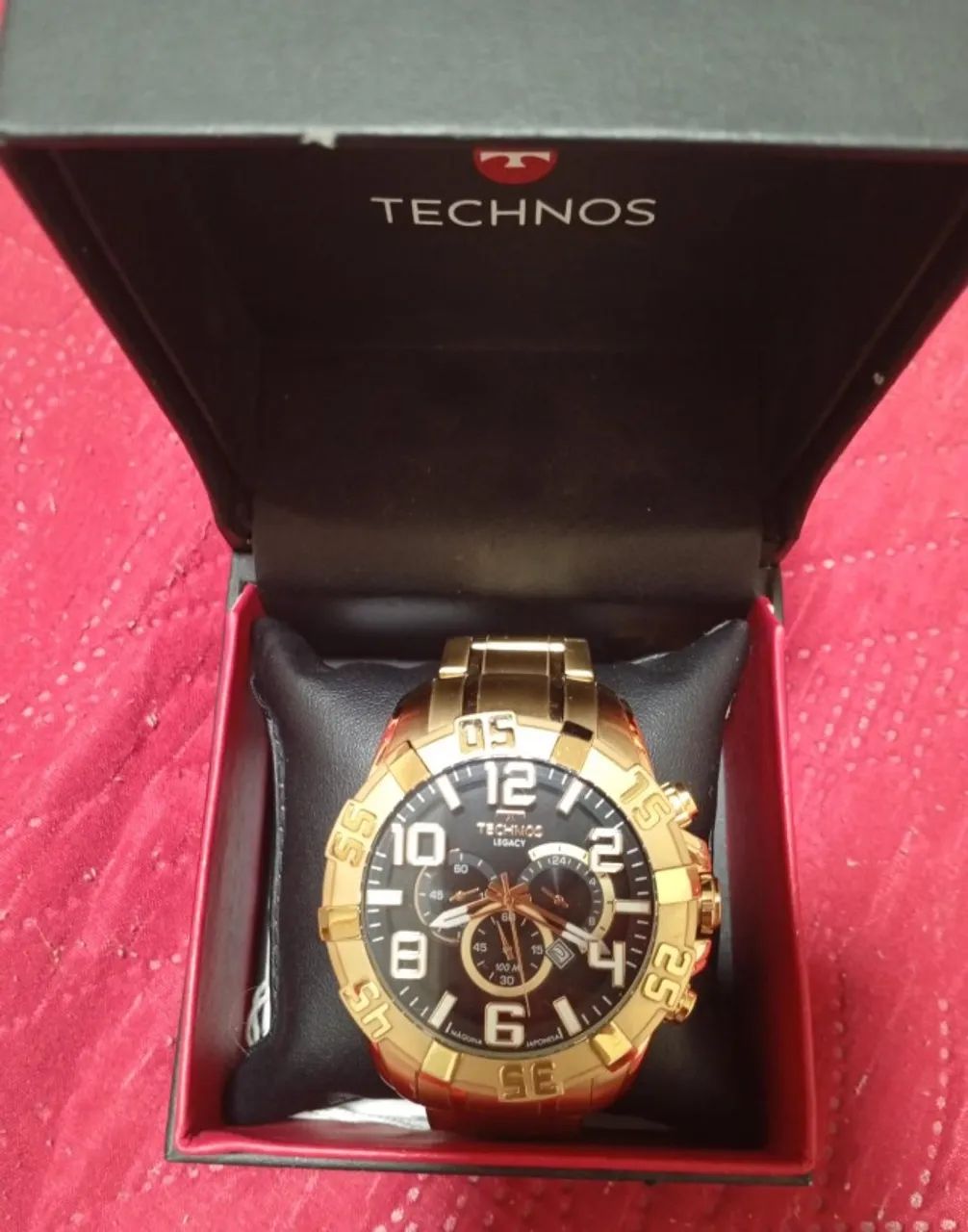 vendo relogio  technos dourado