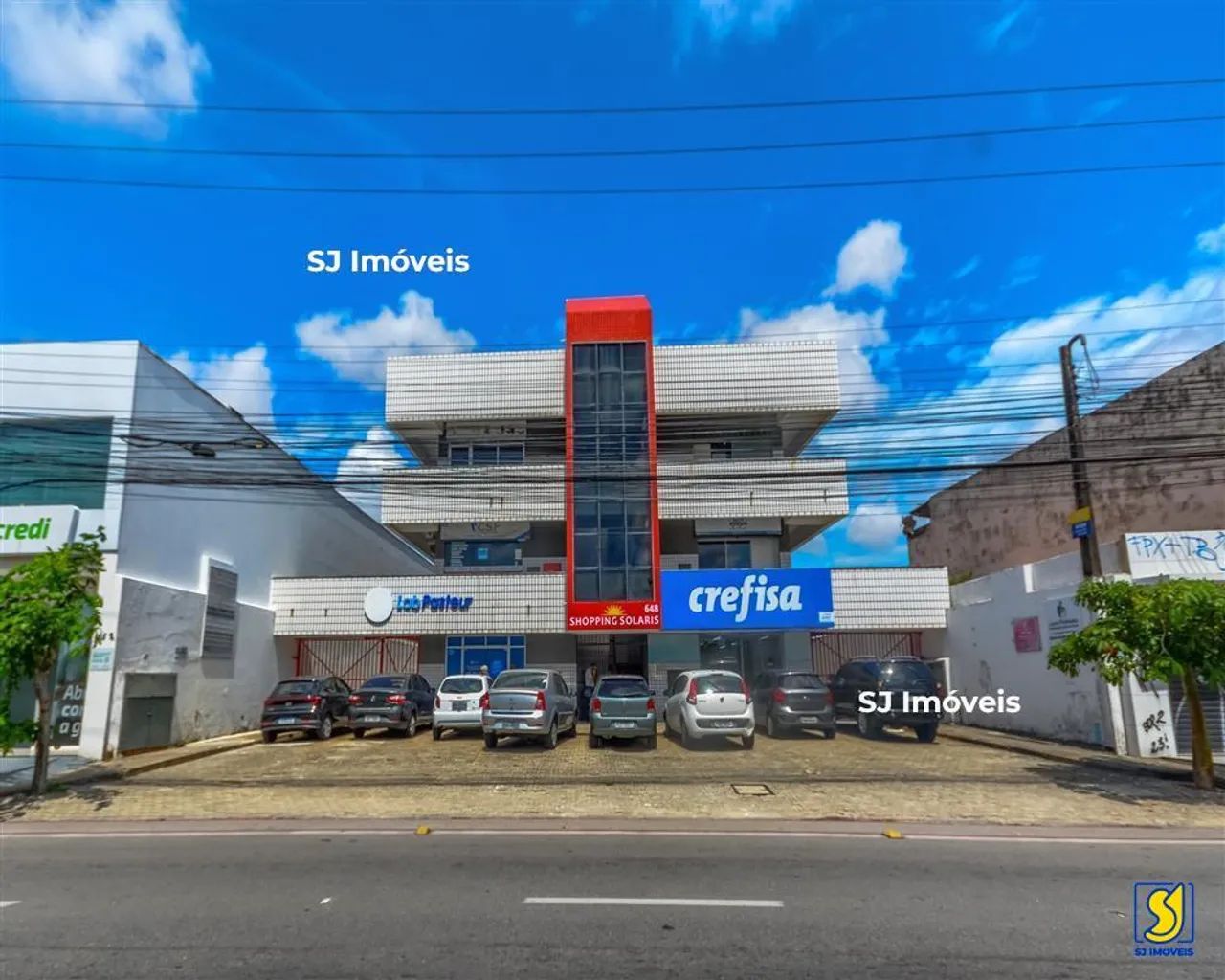 Sala comercial com estacionamento no Bom Futuro