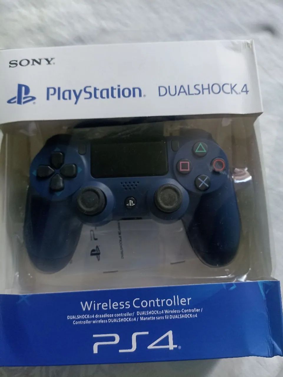 Controle PS4 com dois jogos 