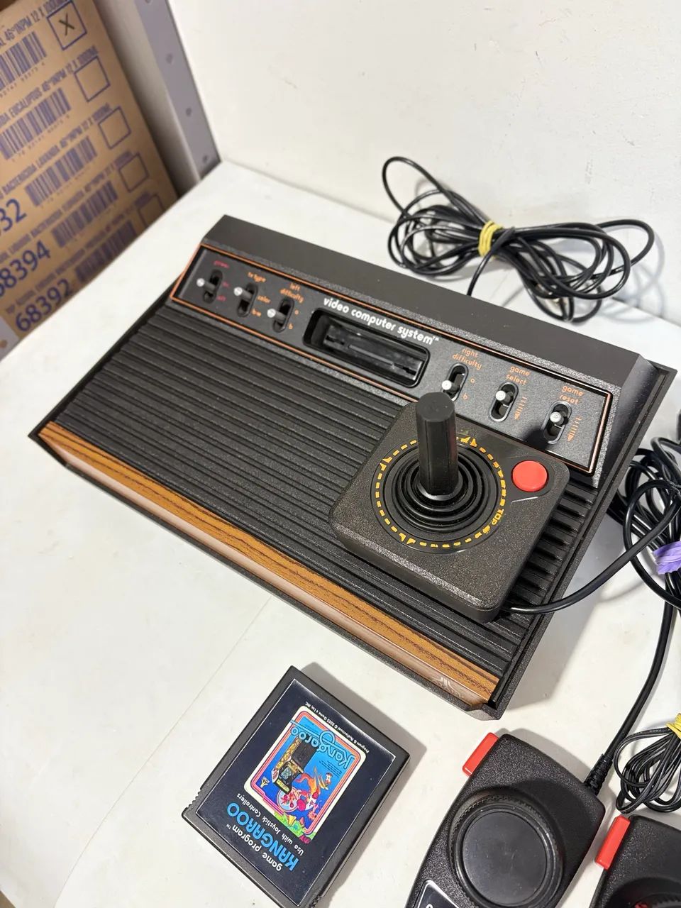 Console Atari 2600  sixier frente de madeira - Foto 3