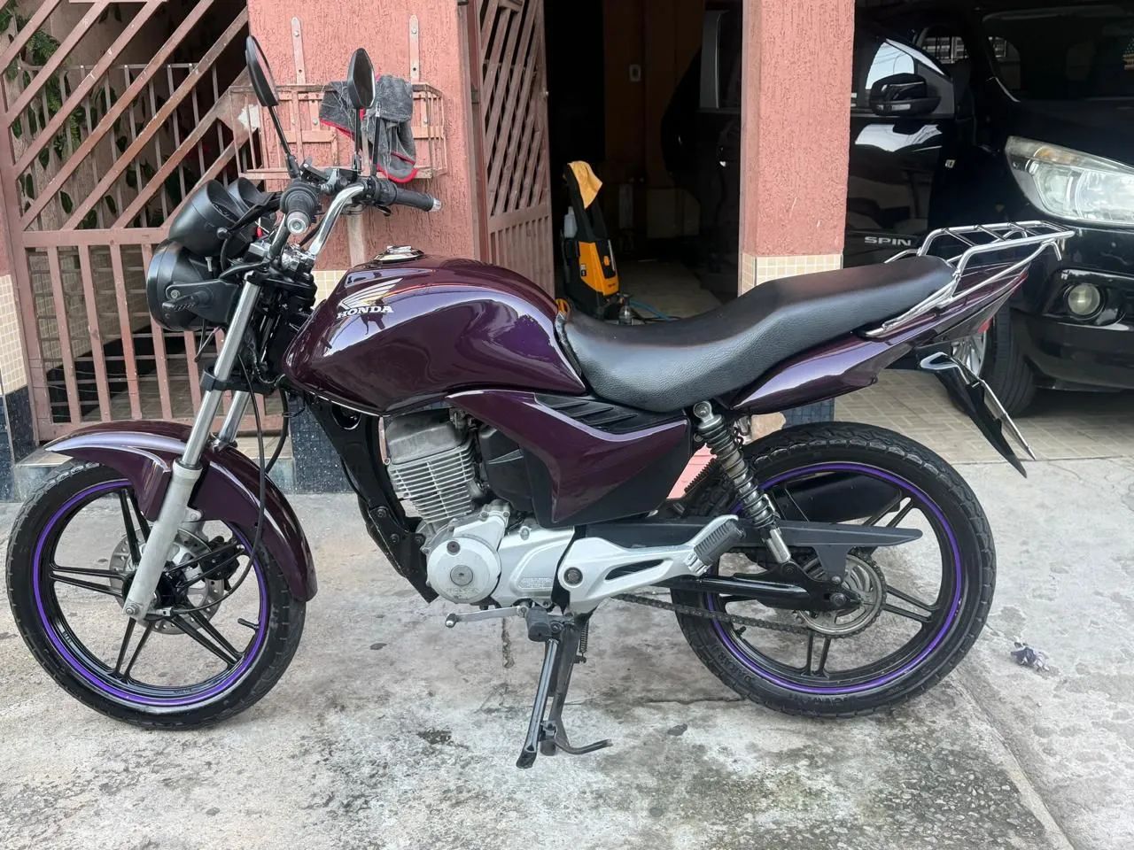 Honda 125 roxa 