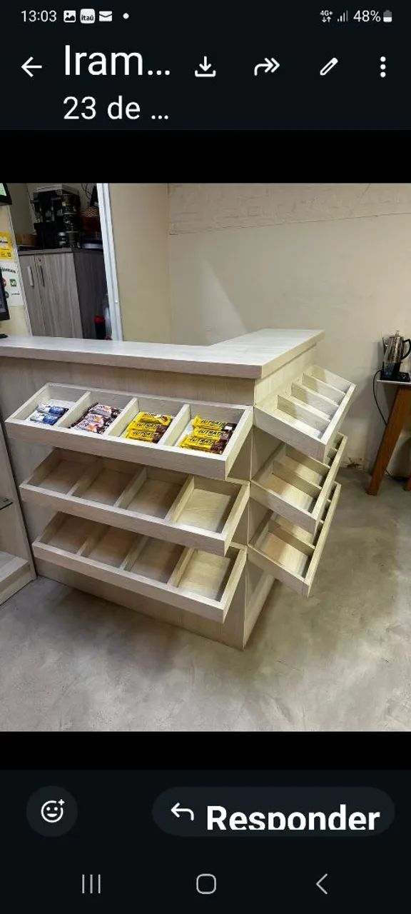 Balcão em L de ótima qualidade com mesa e com 24 nichos.   Só 1000 