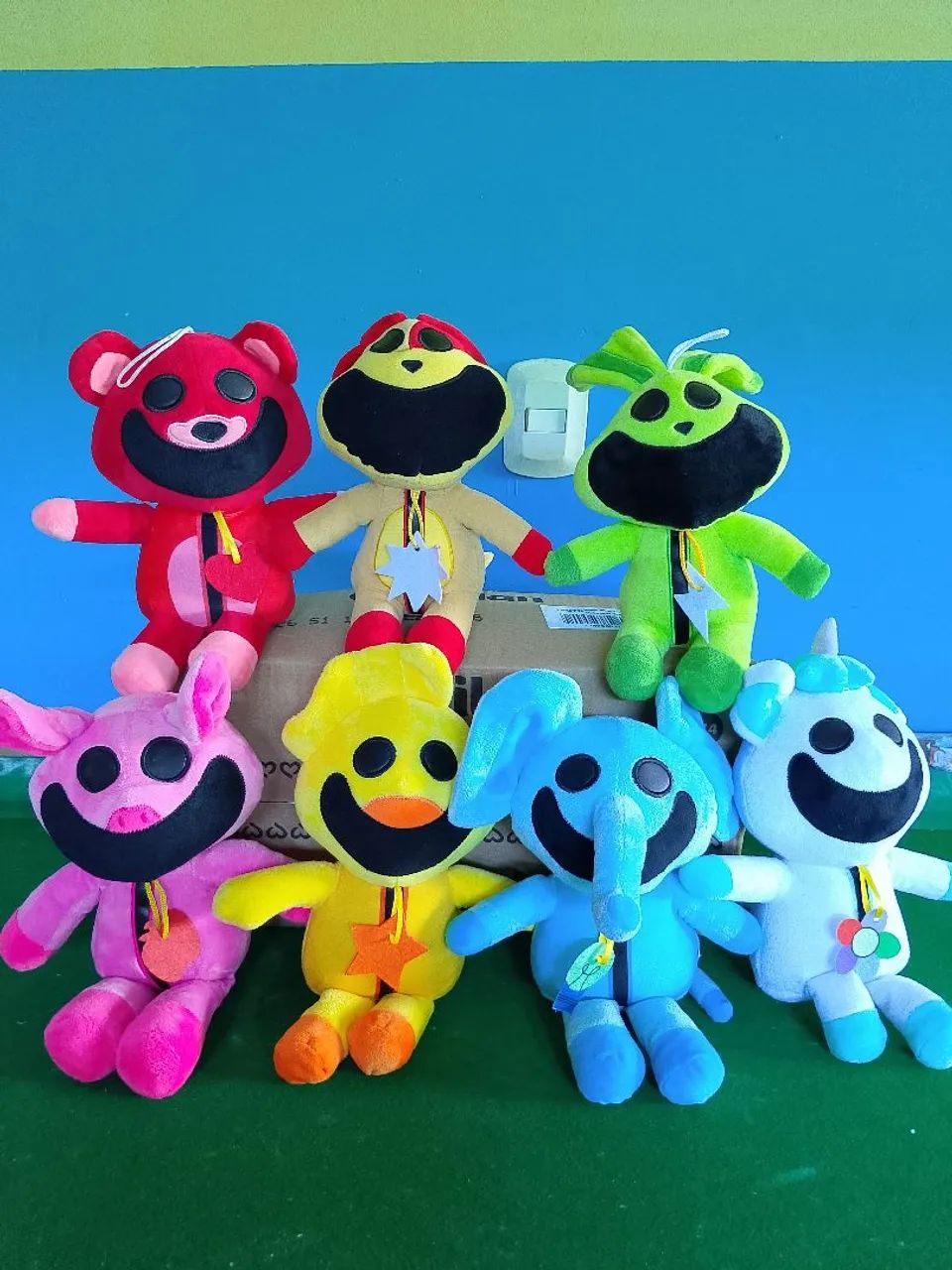 Pelúcia Smiling Critters
