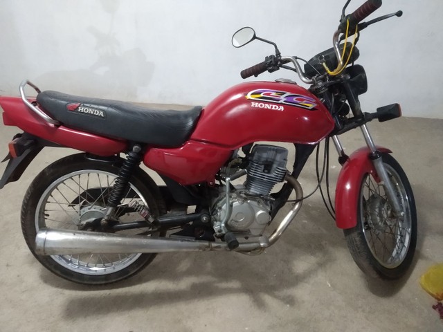 VENDE SE UMA MÓ CG 125 ATRASADA COM DOCUMENTO E RECIBO