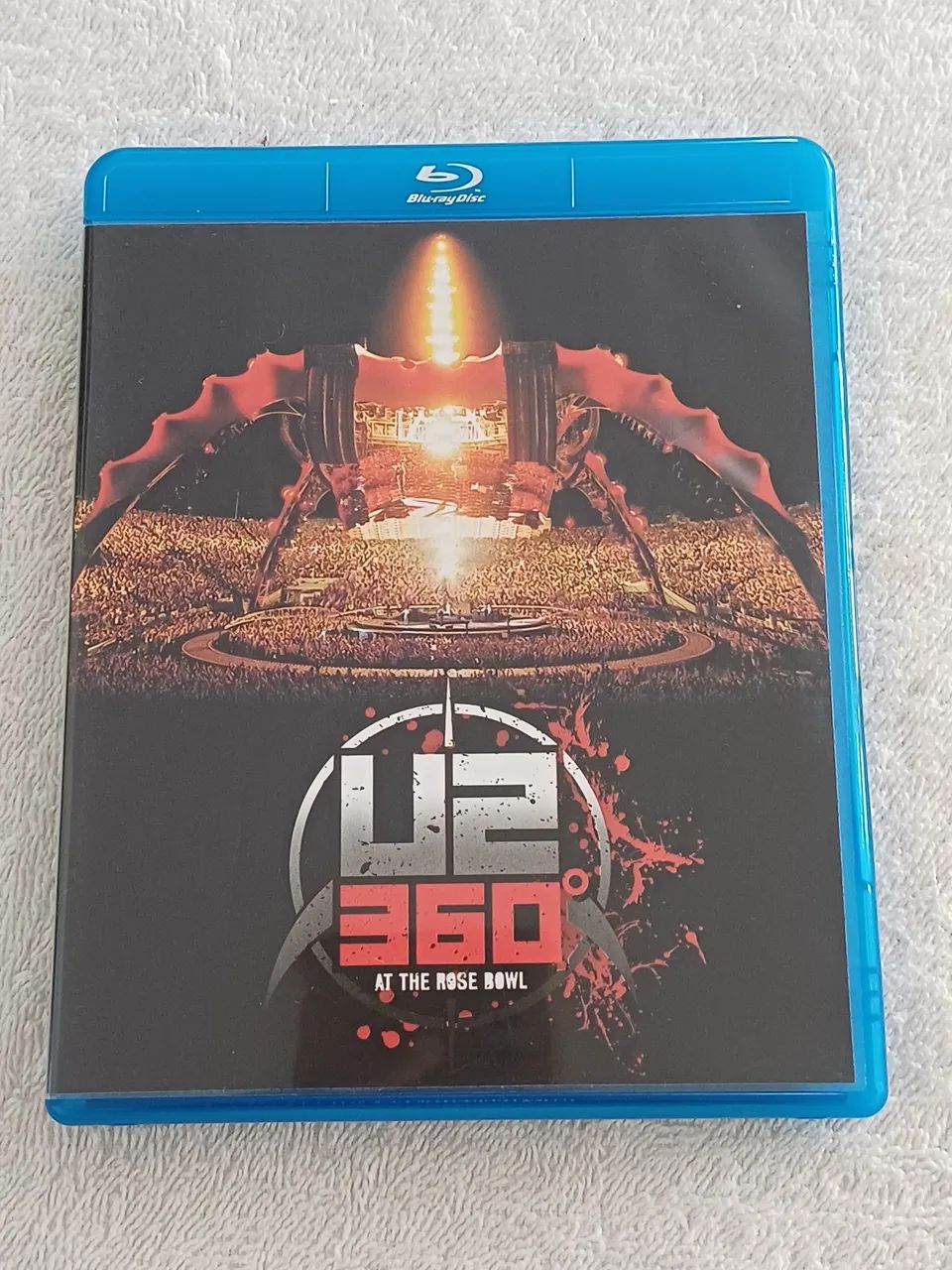 Blu-ray original de um show da banda U2, intitulado "U2 360° At The Rose Bowl"