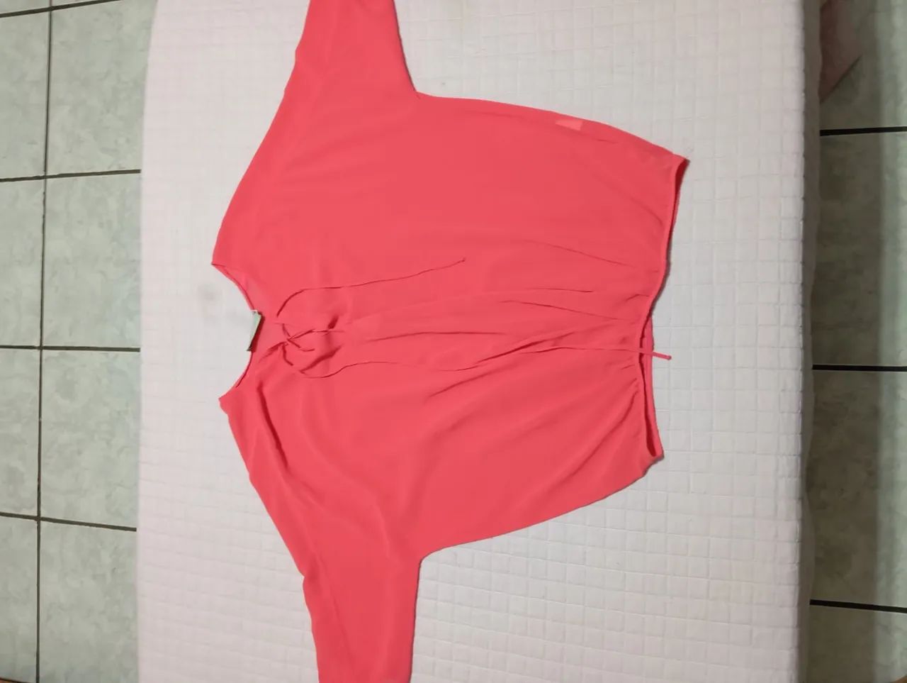 Blusa rosa delicada