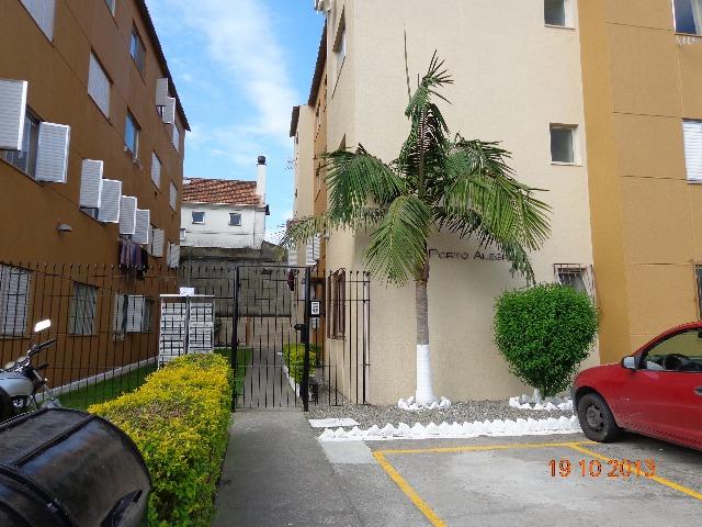 Apartamento térreo defronte Foro, com estacionamento