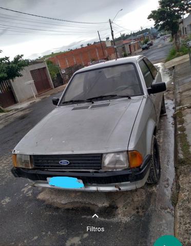 Escort troco por moto