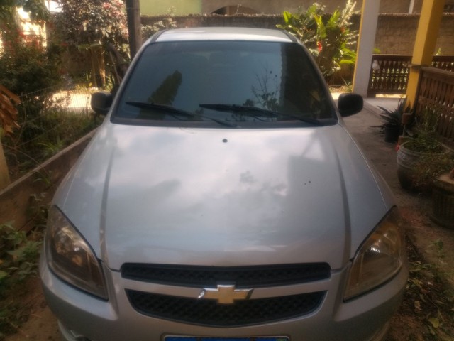 CELTA COMPLETO ,GNV, TROCO OU VENDO.