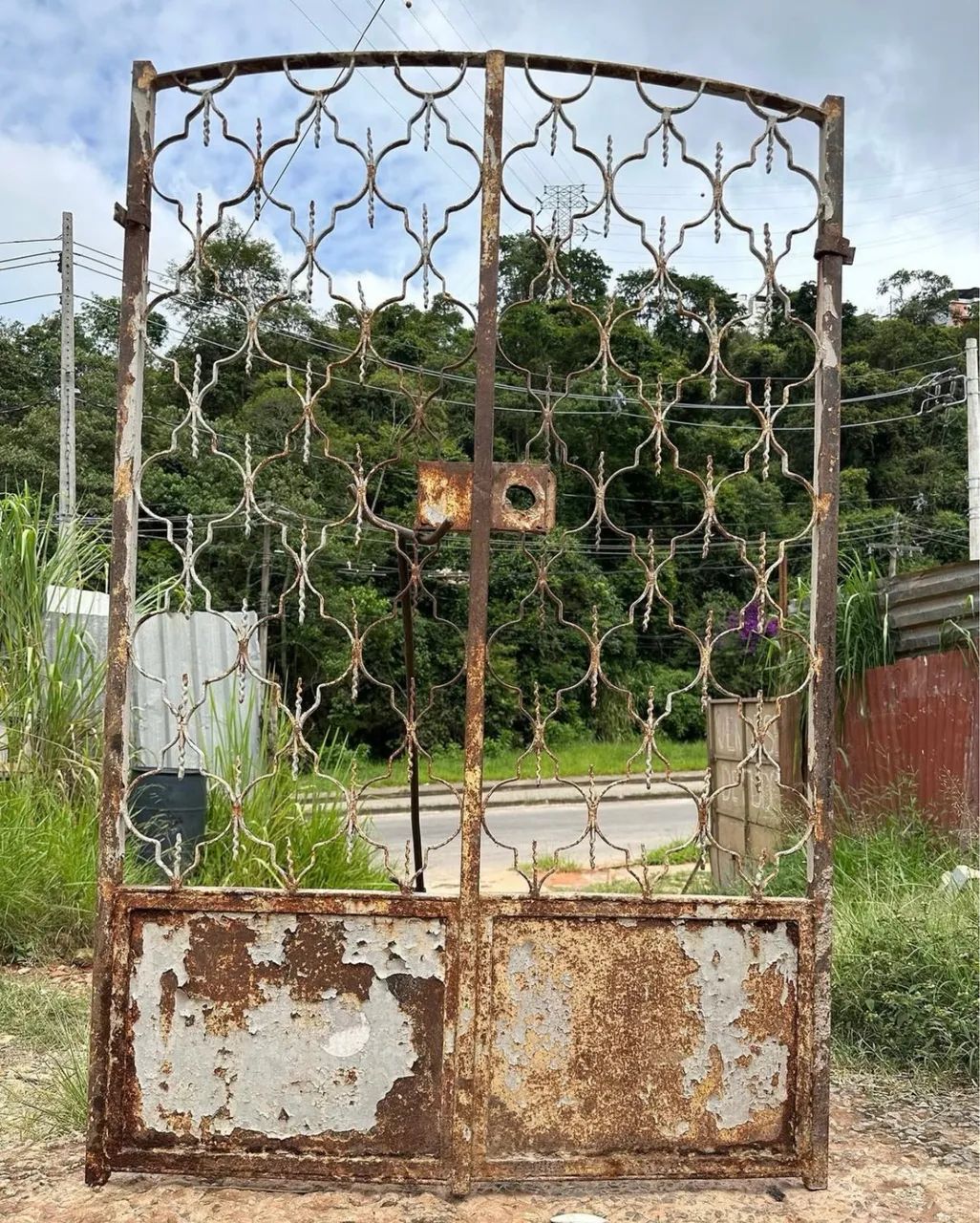 Ancient solid iron gate with two flags461932532219914244
