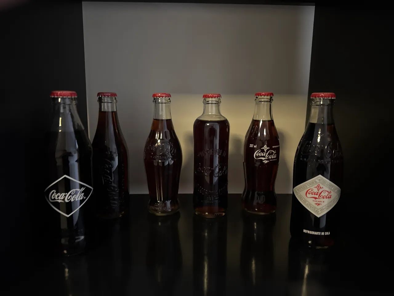 コレクション Coca-ColaThe Eras of Coca-Cola1920-1930 COLEÇÃO DE COCA COLAS VINTAGE - Antiguidades - Setor Noroeste