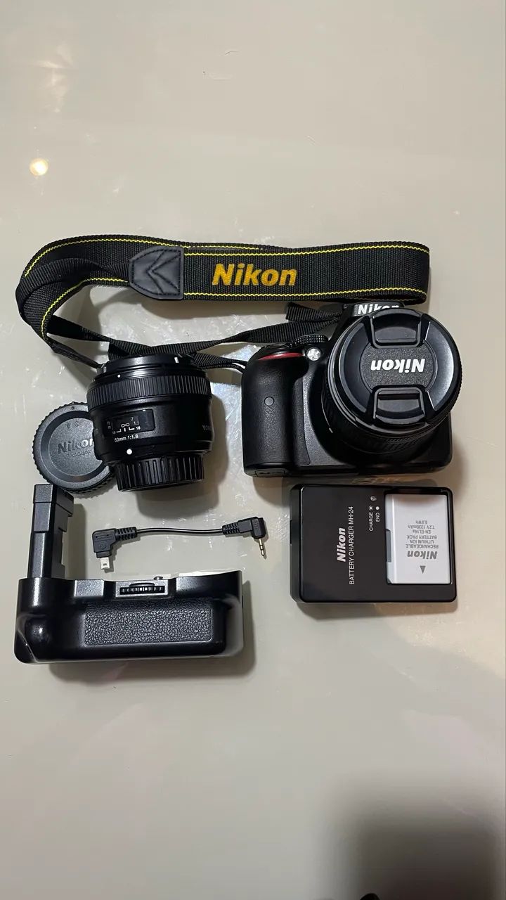 câmera nikon d5300 com 2 lentes e grip (com apenas 10.030 clicks)