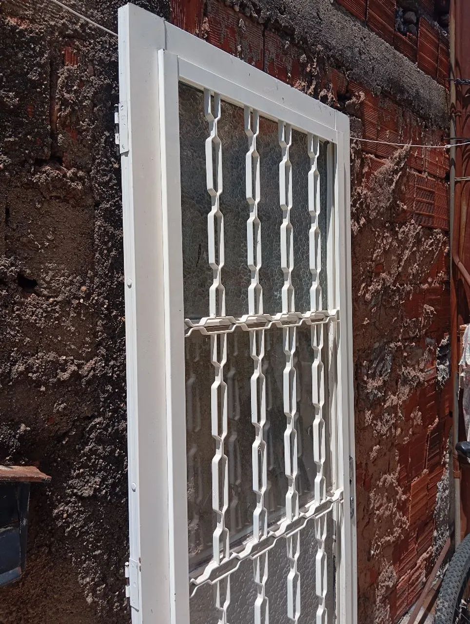 Porta social de giro em aço com postigo e grade - Foto 4