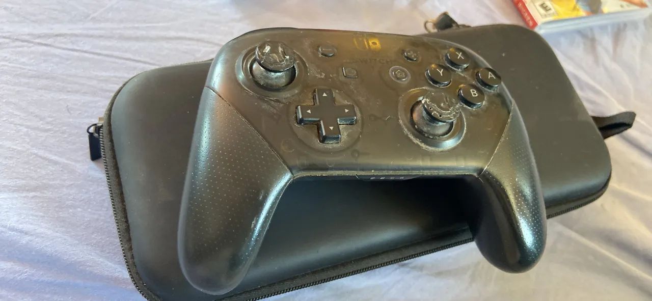 Nintendo Switch v2 BLOQUEADO + Pro Controller, jogo e case de transporte - Foto 2
