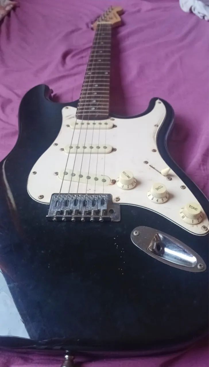 Guitarra + amplificador