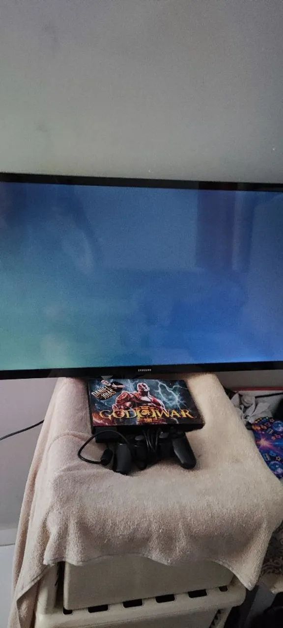 Tv smartv 32 polegadas e Playstation 2 completo com vários jogos no pendrive 