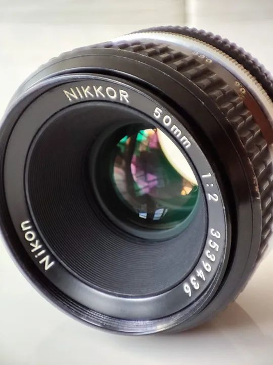 combo lentes Nikkor 50mm f/2 + Nikkor 28mm f/2.8 + estojo Lowepro + disparador remoto - Foto 3
