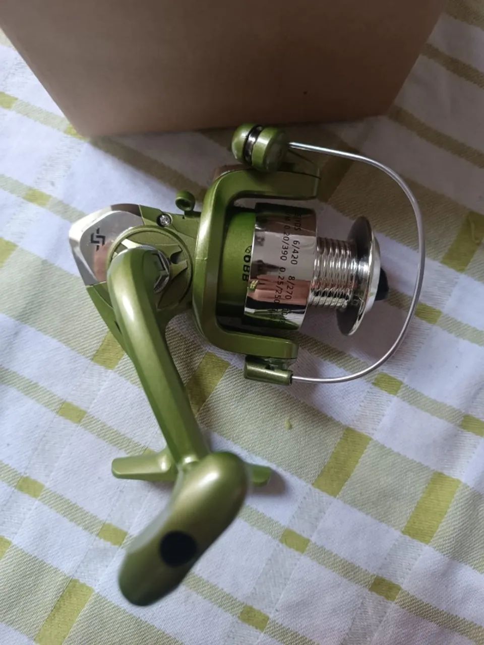 Molinete para pesca Serie 2000 novo na caixa - Foto 6