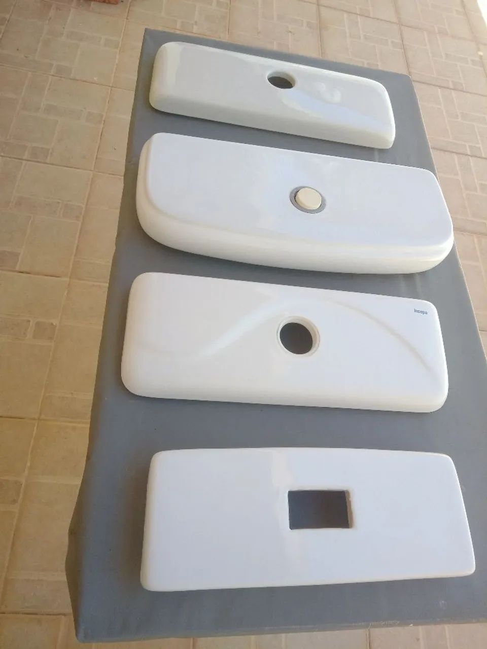 Used Dual-Flush Toilet Tank Lid in Good Condition
