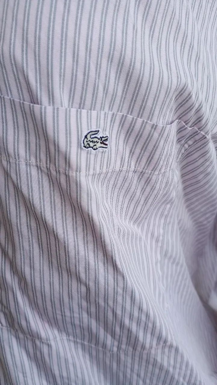 Camisa masculina listrada Lacoste. - Foto 4