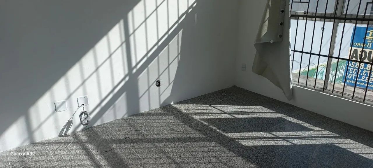 prédio com 2 lojas e 2 salas 8 garagens - Foto 2