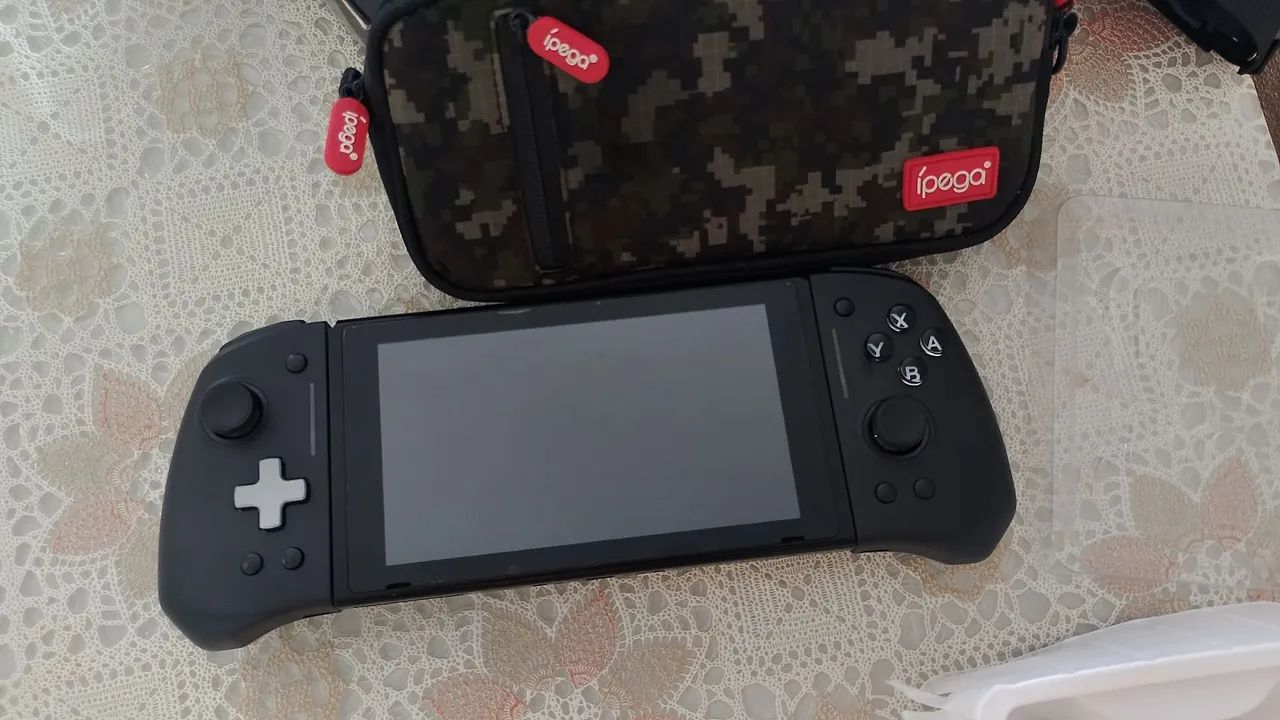 Kit Nintendo switch + jogos e controles - Foto 3