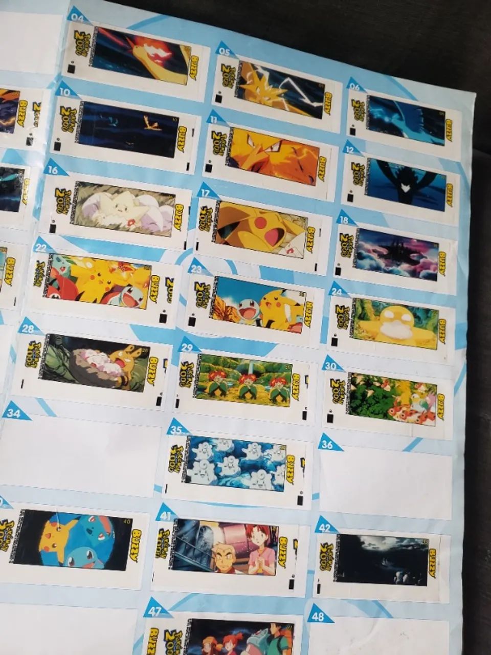 kit Pokémon - raridades / Promo card + pôster original + fita vhs + album de figurinhas - Foto 5