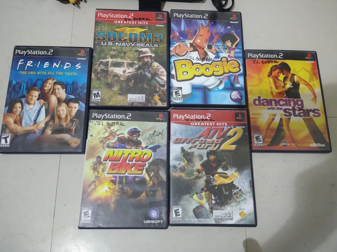 Ps2 em perfeito estado, com 6 jogos e tapete de dança  - Foto 2